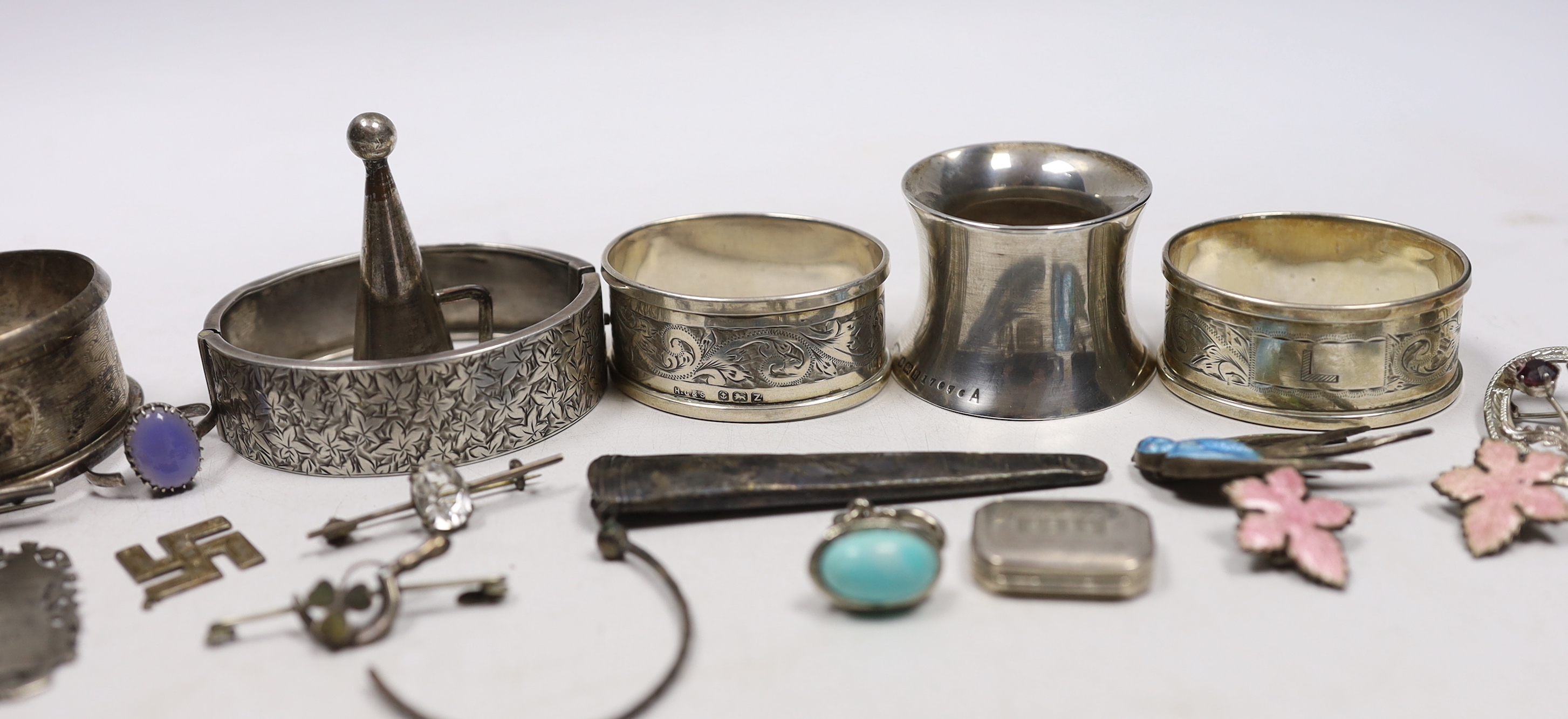 Small silver and other items including napkin rings, bracelets, 19th century vinaigrette, medals, etc.